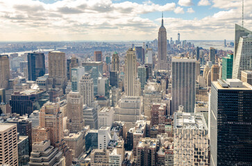 Fototapeta na wymiar Manhattan Skyline with Empire State Building, aerial view, from Rockefeller Center, New York City during winter, horizontal