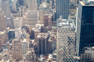 Manhattan Skyscraper, Looking down from Rockefeller Center during sunNew York City winter day, horizontal