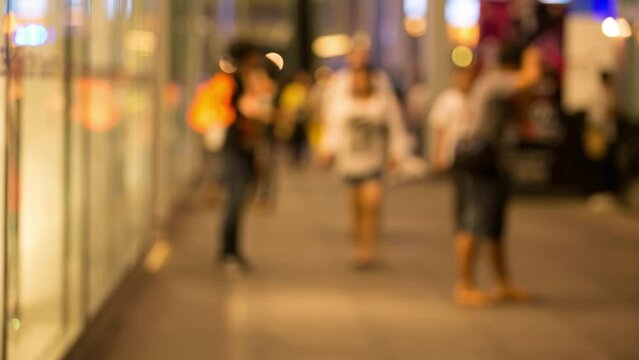 Time lapse of blurred people walking