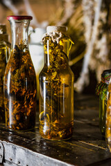 Alcoholic drink, tincture using a snake. Alcoholic drink infused with snake venom. Homemade alcohol with the addition of snake and herbs. A potion with medicinal herbs and a snake.