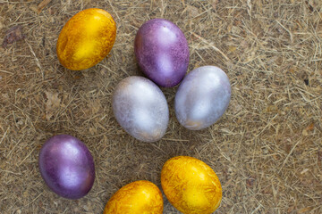 multicolored easter eggs on a combined flat isolated background