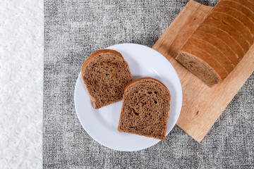 Choco bread loaf slice on a white background. Chocolate flavor	
