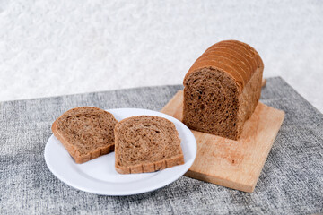 Choco bread loaf slice on a white background. Chocolate flavor	
