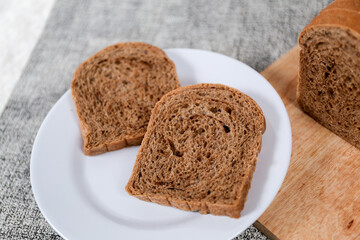 Choco bread loaf slice on a white background. Chocolate flavor	
