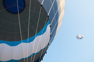 Hot air balloon flying against the blue sky