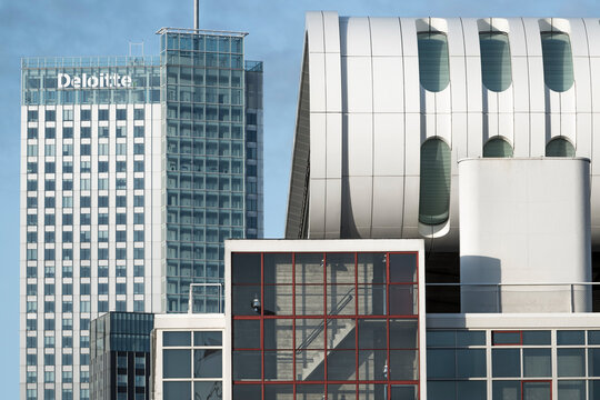 ROTTERDAM, NETHERLANDS - APRIL 2018: 'Maastoren' (headquarters of the Dutch branch of Deloitte) and a detail of 'Het Nederlands Fotomuseum' (photography museum), in the city center of Rotterdam.