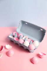 Easter pink and white eggs in a blue tray
