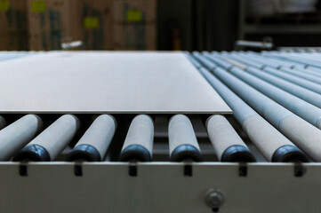 rolling machine in a large format ceramic tile factory.