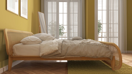 Minimalist scandinavian wooden bedroom with rattan furniture in yellow tones, double bed with duvet and pillows, parquet, window, carpet, mirror and decors. Modern interior design