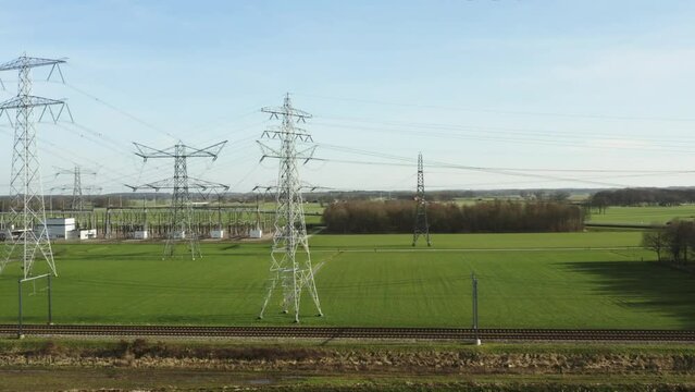 Electricity pylons and train carrying coal, Zwolle, Netherlands