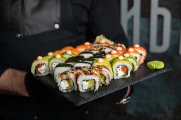 person is going to eat roles. Japanese cuisine
