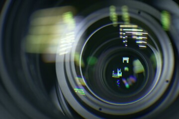 Closeup of professional 4K television zoom lens in news studio
