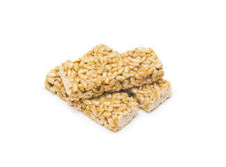 Kozinaki from sunflower seeds isolated on the white background