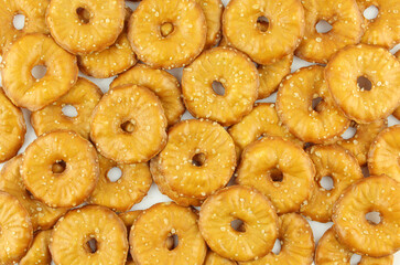 Background of thin sea salt cracker chips isolated on white background