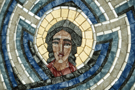 Mosaic artwork of angel. Archangel with wings. Angel of God is an icon in a mosaic