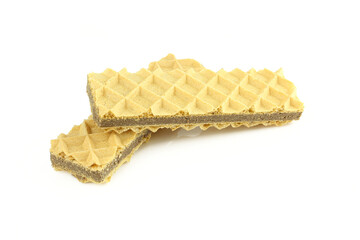 Two sticks of chocolate and hazelnut filled wafers isolated on white background