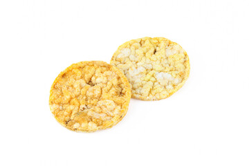 Two super thin flavored corn chips isolated on white background
