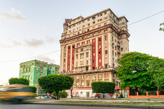 HAVANA, CUBA,  Weathered and run-down republican style apartment building in El Vedado downtown district. The scene is taken in "Calle G" or "Avenida de los Presidentes" 