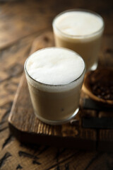 Iced coffee drink with milk foam