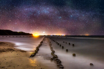 The night landscape of the Baltic Sea and the milky way in Babie Doły. Poland