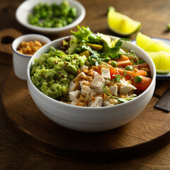 Healthy bowl with chicken and avocado