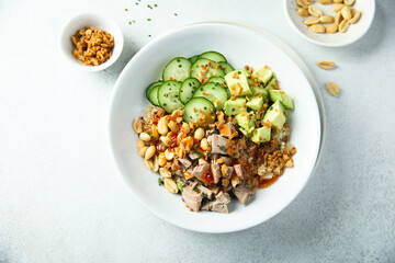 Rice bowl with duck and avocado