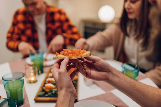 Focus on a bruschetti on a house dinner party.