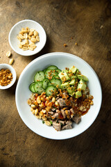 Rice bowl with duck and avocado