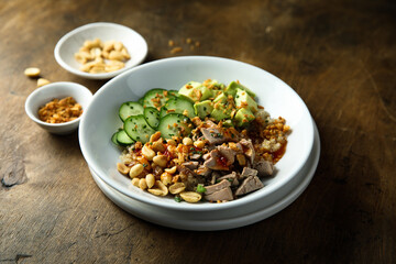 Rice bowl with duck and avocado