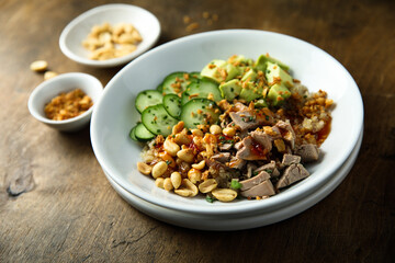 Rice bowl with duck and avocado