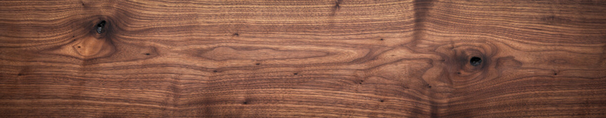 Long plank texture background. Panoramic wood plank texture background. Walnut wood plank natural texture. Wooden plank natural texture background with knots.