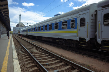 The passenger train departs from the platform of the Kiev railway station