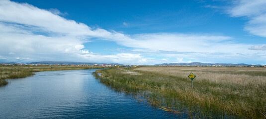 Uros Island floating community, Lake Titicaca, Peru. Home to the indigenous Uro people. 