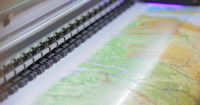 Modern Digital Large format UV printer. Printing production technologies. UV pinning is the process of applying a dose of low intensity ultraviolet light to a UV curable ink