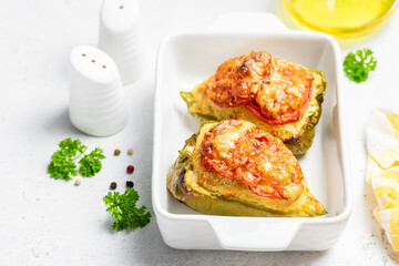 stuffed bell peppers in baking dish. Copy space.