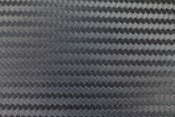 Black carbon kevlar fiber background.