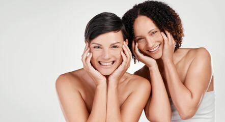 New faces, new beauty. Cropped portrait of two beautiful mature women posing against a grey background in studio.