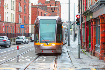 Public tram on the street in Dublin,  İreland