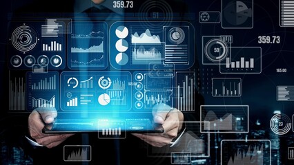 Big Data Technology for Business Finance Analytic conceptual. Modern graphic interface shows massive information of business sale report, profit chart and stock market analysis on screen monitor.