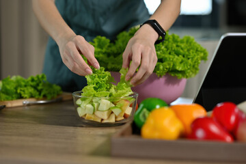 Close up woman preparing vegetables for cooking in the kitchen, for food, health and cooking concept.
