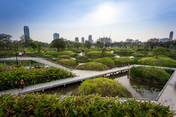 Landscape view of the new park in Bangkok There are beautiful walking paths and landscaping with...