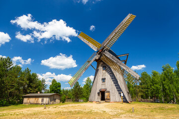 Fototapeta na wymiar Dutch type windmill from Brusy, Wdzydze Kiszewskie, Poland.