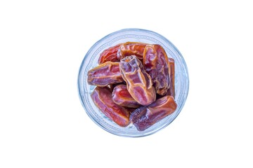 Top view date fruits in bowl on isolated white background