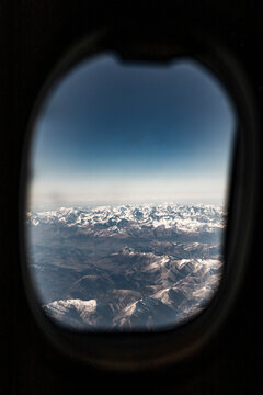 View of French Alps from the airplane window, France.