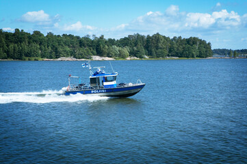 Finish Police patrol  boat patrolling on the sea. 
