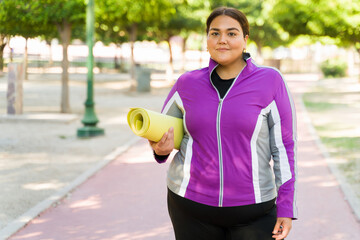 Obese woman preparing for working out