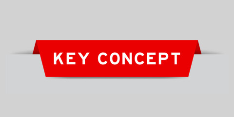 Red color inserted label with word key concept on gray background