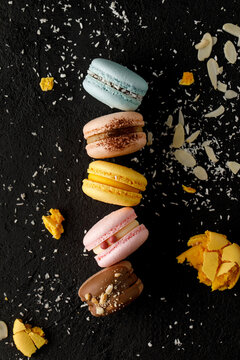 Macarons with black background.