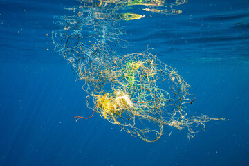 Fishing waste floating in the sea.