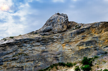 August 27, 2021 the Republic of Crimea in the vicinity of the village of Novy Svet. Two girls take a selfie on top of a mountain.
